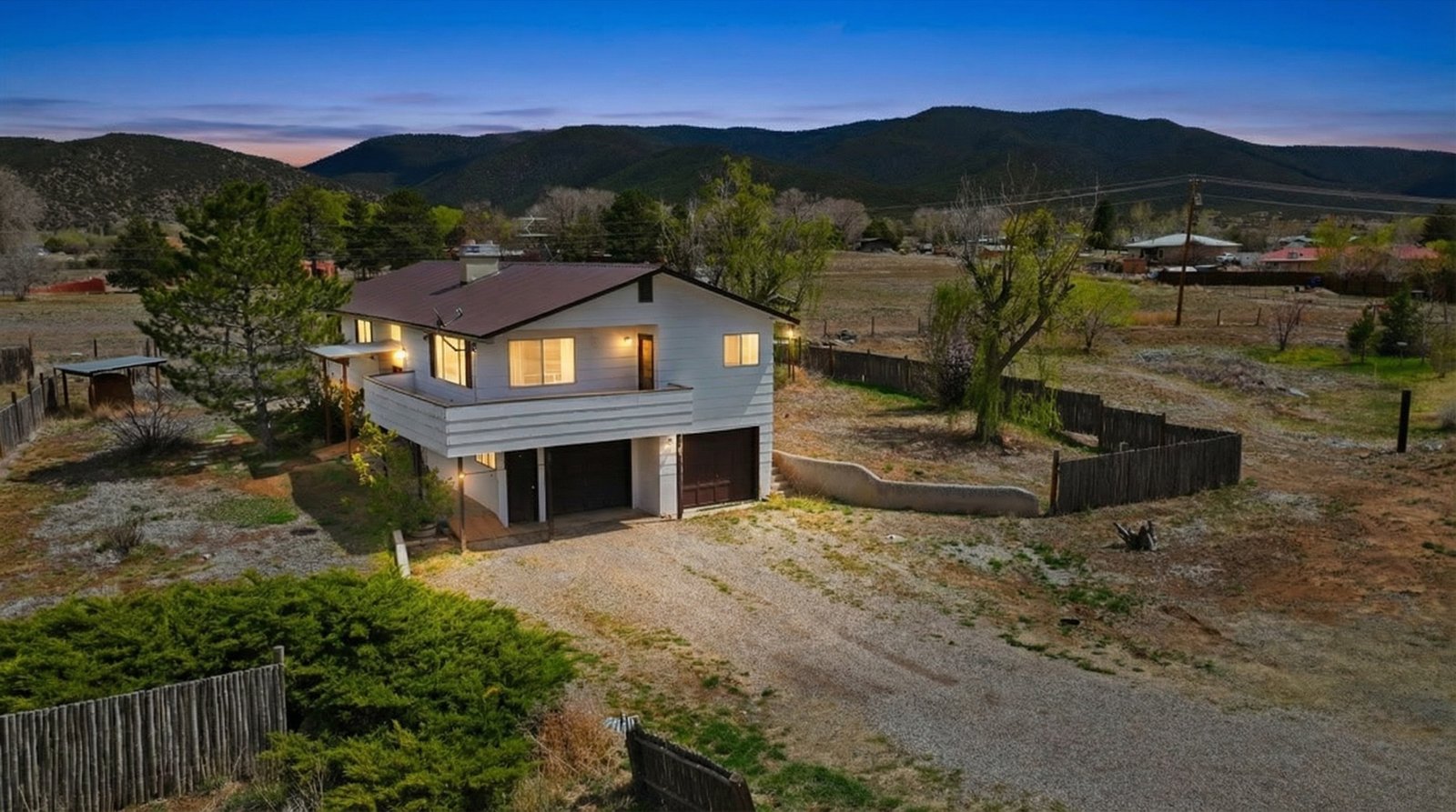 A luxury home photographed at twilight